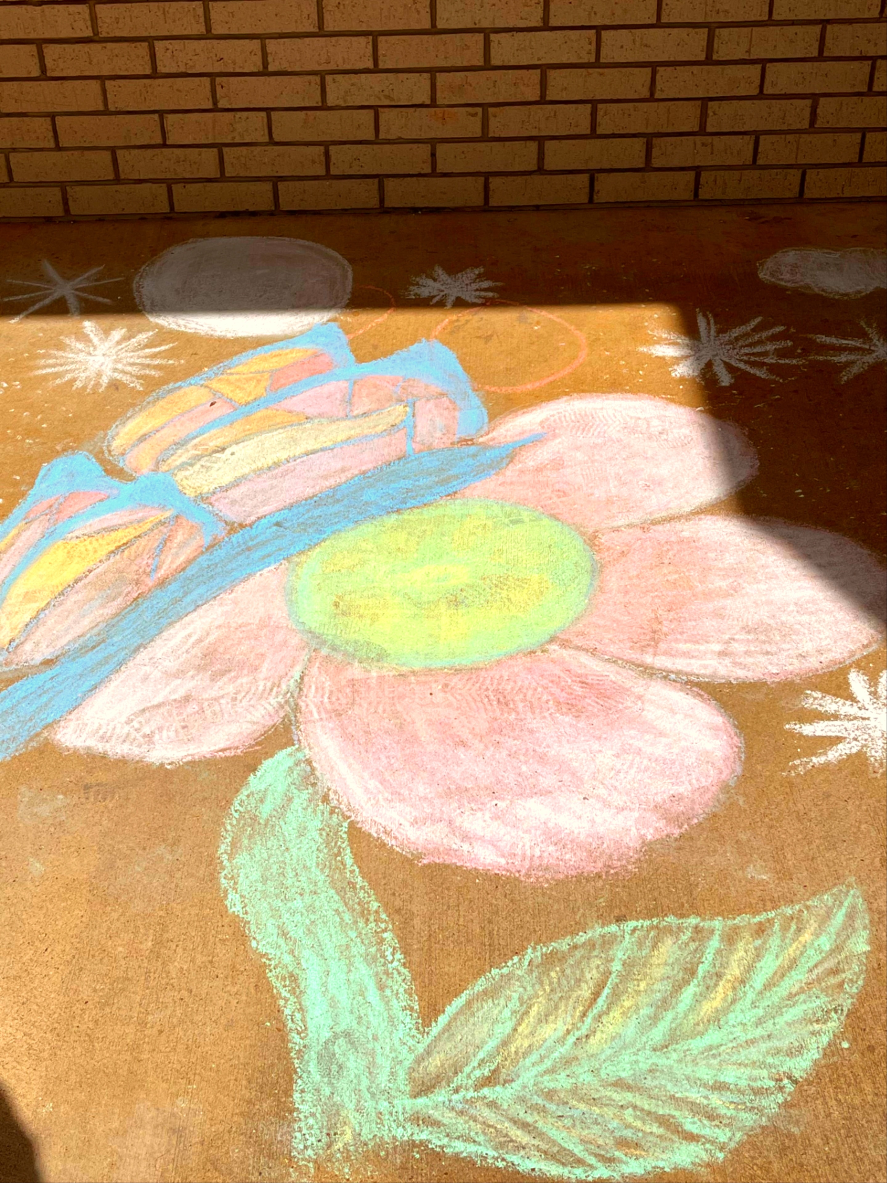 Artist creating chalk portrait at street art festival in East Texas